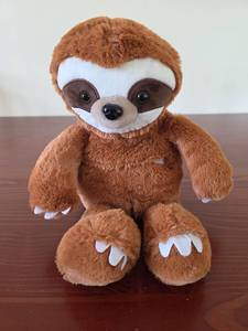 lot 548 image: Aroma Home Sloth Plush Stuffed Animal with Heat Pack