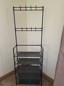 lot 549 image: Black Plastic Coat Rack with Shoe Shelves