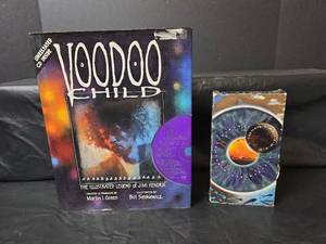 lot 554 image: Voodoo Child The Illustrated Legend of Jimi Hendrix with CD & Pink Floyd Pulse VHS