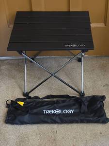 lot 576 image: Trekology Folding Camp Table with Carry Bag
