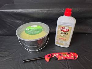 lot 577 image: Citronella Candle, Lighter, and Lighter Fluid