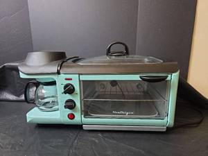 lot 50 image: Nostalgia 3-in-1 Breakfast Station with Toaster Oven, Coffee Maker, and Griddle