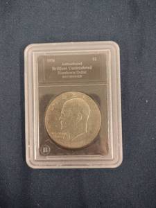 1976 authenticated brilliant uncirculated Eisenhower Dollar