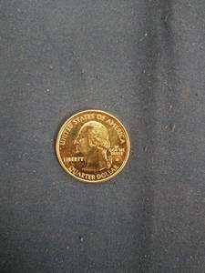 lot 60540 image: GOLD PLATED 1999-D Deleware U.S. STATE QUARTER