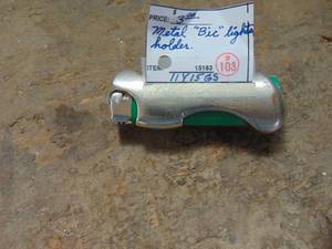 lot 1620 image: Metal Bic Lighter Holder