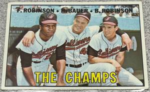 lot 176 image: 1967 Topps Baseball Card #1 - The Champs F. Robinson Bauer B. Robinson