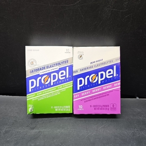 lot 1244 image: Propel Electrolyte Enhanced Water Drink Mix Powder Packets, Kiwi Strawberry and Berry Zero Calorie & Zero Sugar Hydration with Electrolytes and Vitamins C & E BB 1125 and July 26