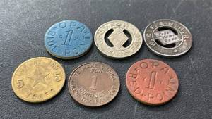 lot 42 image: Collection of 6 Historic Tax and Transit Tokens
