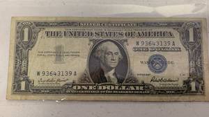 lot 12 image: One dollar silver certificate Blue Seal Series 1957 - Serial Number W93643139 A
