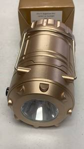 lot 36 image: One Pc BrightEase Mini Lantern with Spotlight gold color