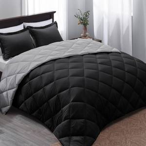 lot 340 image: RED AND BLACK PHOTO FOR REFERENCE Basic Beyond King Size Comforter Set - Black Comforter Set King, Reversible King Bed Comforter Set for All Seasons, BlackGrey, 1 Comforter (104x92) and 2 Pillow Shams (20x362) - Retail $49