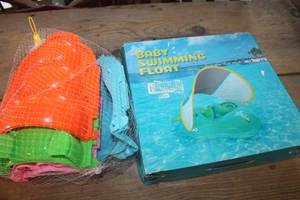lot 1064 image: NIP Sand Toys and Baby Pool Float