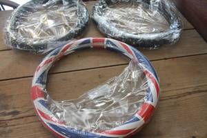 lot 1076 image: NIP Steering Wheel Covers