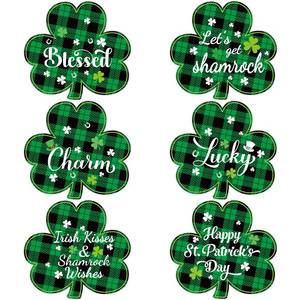 lot 31065 image: OBUSATT St. Patricks Day Plastic Placemats Set of 6 Reusable Buffalo Plaid Plastic Place Mats Easy Clean Clover Shape Tableware Mats Wipeable Lucky Shamrock Table Decor for Party Kitchen Dining - Retail $10