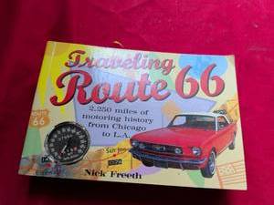 lot 14 image: Traveling Route 66 Collectible Book with Speedometer