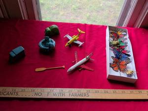 lot 28 image: Mixed Toy Collection with Decorative Butterflies and Small Figurines