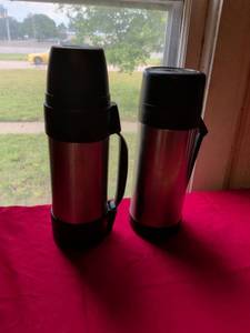 lot 73 image: Set of Two Red Stainless Steel Vacuum Insulated Thermos Bottles