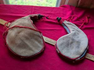 lot 106 image: Traditional Leather Water Canteens with Red Rope Straps