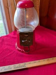lot 116 image: Red Glass Globe Gumball Machine with Metal Base