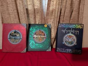 lot 148 image: Dragonology Monsterology Wizardology Complete Book Set by Candlewick Press