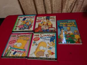 lot 151 image: The Simpsons Guide Book Collection Set of 5