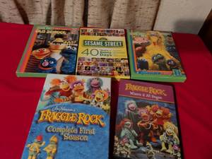 lot 188 image: Jim Henson Childrens TV Show Collection - Sesame Street and Fraggle Rock BooksDVDs