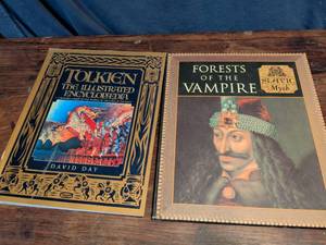 lot 214 image: Tolkien Illustrated Encyclopedia and Forests of the Vampire Book Set