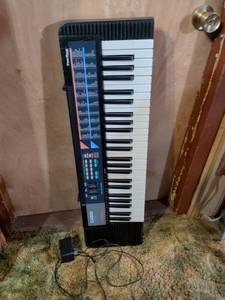 lot 331 image: Casio CA-110 Electronic Keyboard with Power Adapter