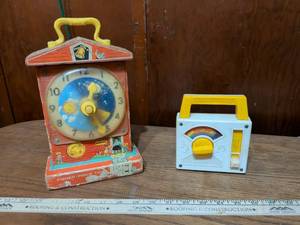 lot 387 image: Fisher-Price Teaching Clock and Music Box Radio Toy Set