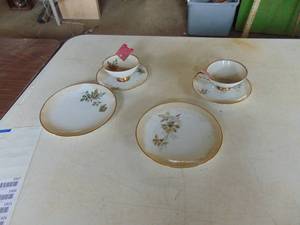 lot 1915 image: Mixed Pair of Tea Cups - Saucers