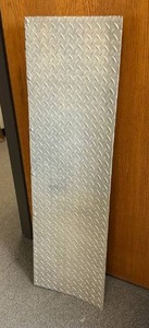 lot 4 image: Diamond plate ramp 3.5 x 48 x 16 in