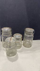 lot 1010 image: Mason Canning Jars with Wire Bail Lids Set of 4