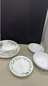 lot 1027 image: Corelle floral plates and colored rimmed bowls 23 pieces