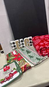 lot 1037 image: Christmas towels, pot holders, blanket and decor