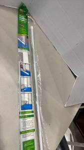 lot 1090 image: Self adhesive door bottom seal, and spring tension rod