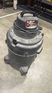 lot 1130 image: Shop-Vac 2.25 HP WetDry Vacuum Cleaner hose is inside