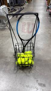 lot 1138 image: Wilson tennis racket with metal holder and tennis balls