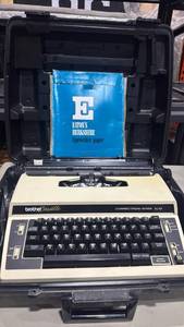 lot 2043 image: Brother Correctron-Riter XL10 Electric Typewriter with Case and paper