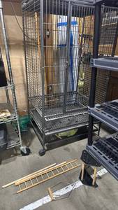 lot 2044 image: Rolling bird cage needs castor with accessories 57x30x24