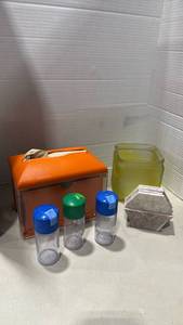 lot 2062 image: Napkin dispenser, seasoning dispensers, and more