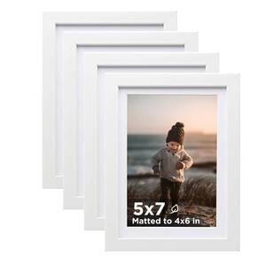 lot 1435 image: KINLINK 5x7 Picture Frame White Set of 4, Wooden Photo Frames Matted 4x6 with Plexiglass for 4x6 with Mat or 5x7 without Mat for Table and Wall Display&nbsp