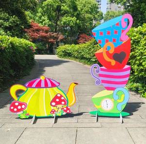 lot 1627 image: Alice Party Decorations Wonderland Yard Decor,Garden Tea Party Decorations Yard Stakes Stand Set, 1 Set Stacked Teacups and 1 Set Teapot with Brackets - Retail $20