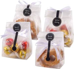 lot 1700 image: YunKo Cookie Bags for Packaging, 100 Pack Cellophane Treat Bags for Gift Giving, 3.4 x 9 in Cookie Packaging for Homemade Treats, Muffins, Candy, Mini Loaf, Party Favors, Black Dot - Retail $8