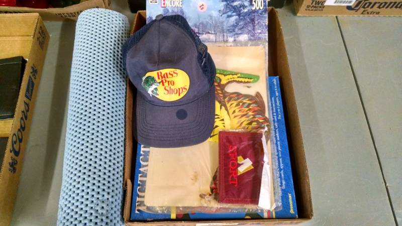 lot 1041 image: Flat of Misc. Puzzles, Game, Turkey Center Piece, Cap, Sport Wallet