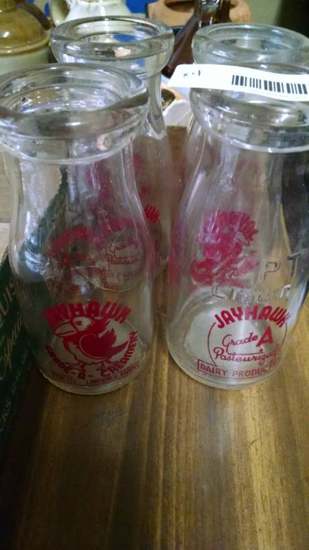 lot 1093 image: 4 Vintage Jayhawk Grade-A-Creamery Milk Bottles 12 Pint