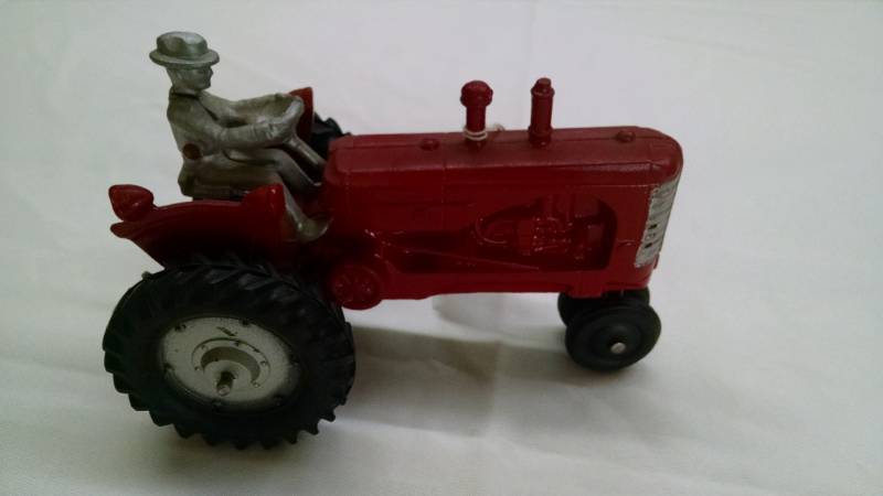 lot 1136 image: Slik Massey Harris Tractor
