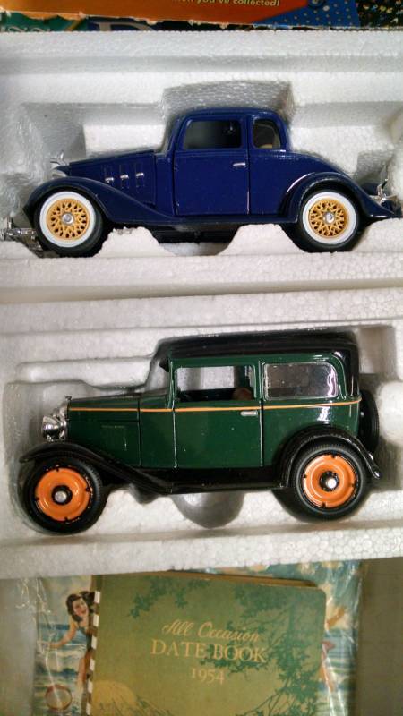 lot 1178 image: 2 pcs. National Motor Museum Mint Die Cast Cars - 1930 Chevy Coach, 1933 Chevy 5 Window Coupe