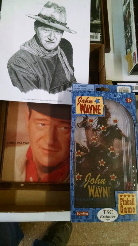 lot 1199 image: John Wayne Pictures & Pinball Game