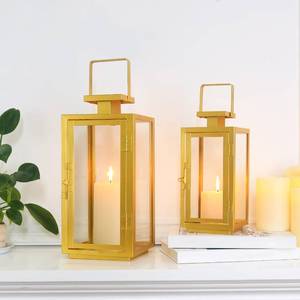 lot 2254 image: DECORKEY Christmas Lanterns Decorative Outdoor&Indoor, 17&13 Metal Golden Lanterns Decorations for Home, Modern HangingTabletop Candle Holders for Front Door Porch Patio Decor - Retail $33
