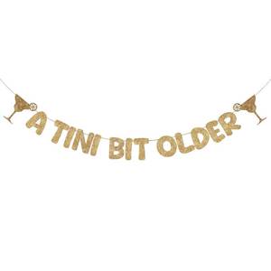 lot 546 image: Fulmoon Pre Strung A Tini Bit Older Banner Glitter Martini Party Decorations Martini Bar Party Decorations Birthday Banner for Women(Champagne Gold) - Retail $8
